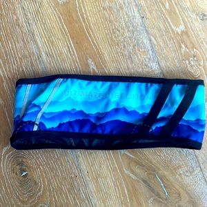 Ultimate Direction running belt “flip belt” - women’s small. Never used.